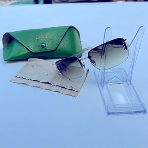 Kate Spade green sunglasses w/ case and wipe. Add a pop to your summer outfit!